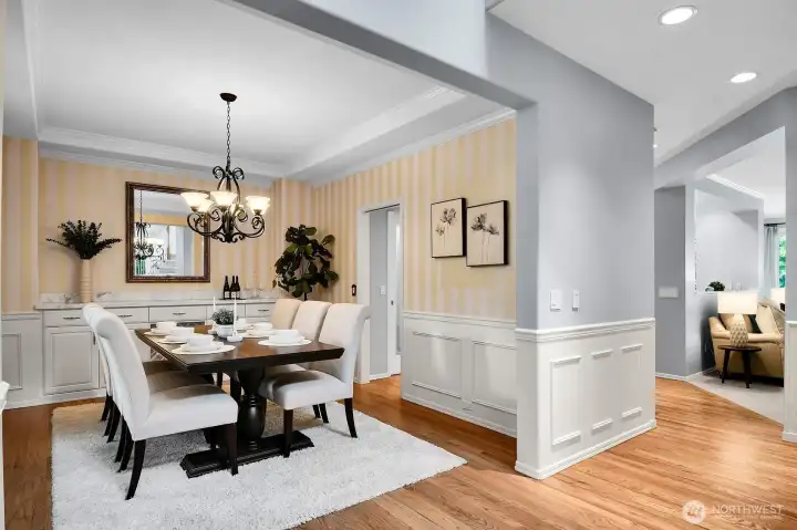 Adjacent is the dining room with built-in buffet.  There is a butler's pantry between the kitchen and dining room with a prep sink and  beverage fridge.
