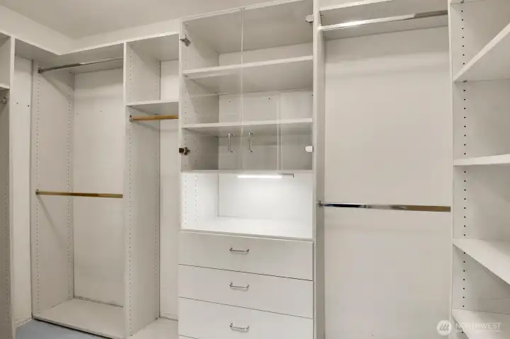 There are His and Hers double walk-in closets!  Both outfitted with high quality organizers.