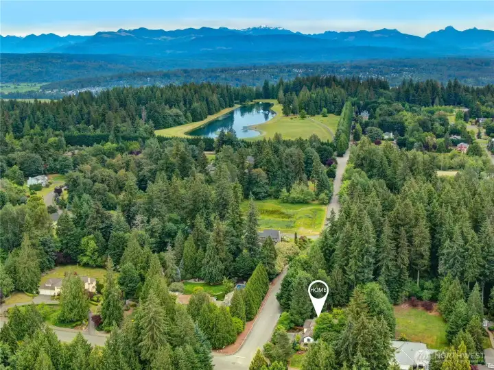 Lake of the Woods is a highly sought after neighborhood with excellent schools, parks, playgorunds, tennis courts, trails and the charming community lake.