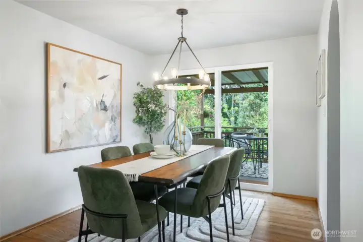 Transition through slider from the formal dining to a private, fully fenced, backyard w/expansive entertainment patio