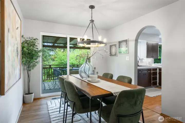 Dining room floor plan is open to the living room, right off the kitchen, with direct access to the deck makes this very well-suited for hosting.
