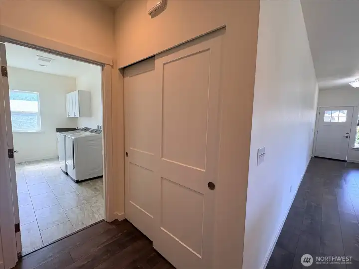 Hall Closet-Entrance to Laundry & Garage Entrance
