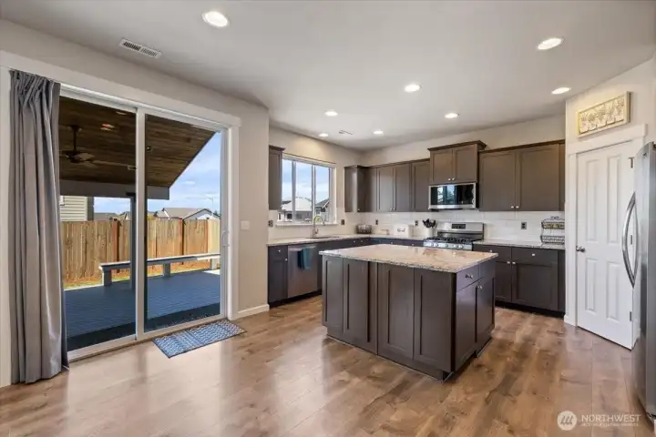 Big sliders leading out to the deck from the kitchen area. Natural light with views to the West!