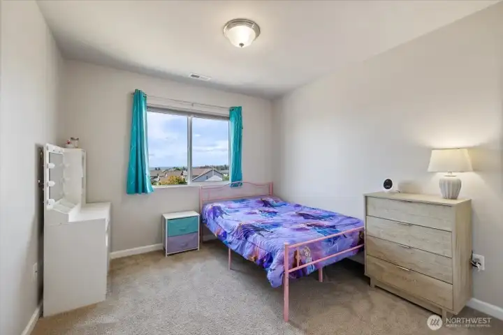 One of 5 bedrooms, and this one has a mountain and water view!