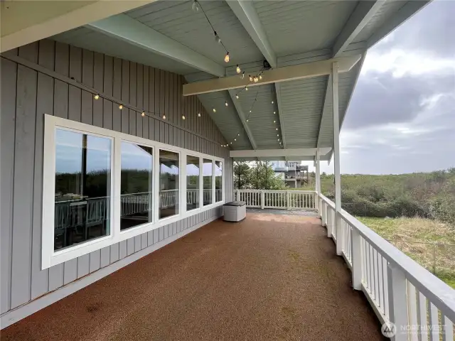 Upper level covered deck.