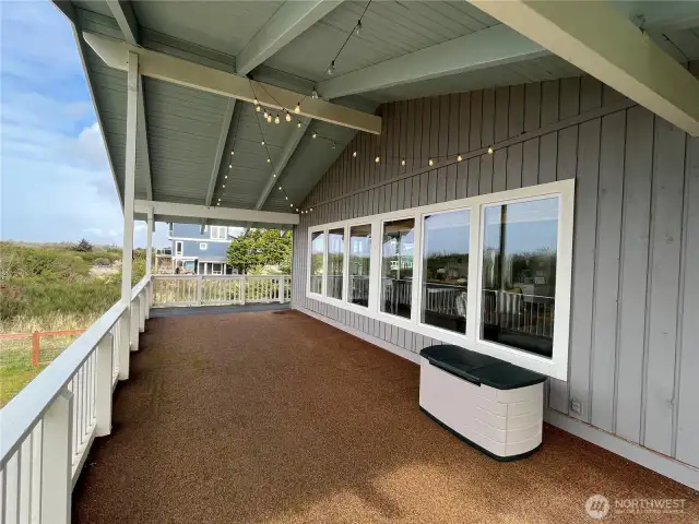 Upper level covered deck.