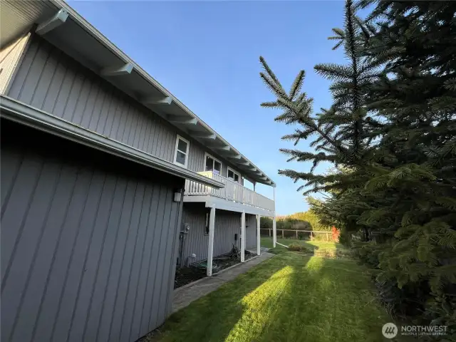 Fantastic side yard is perfect for Fido's dog run.