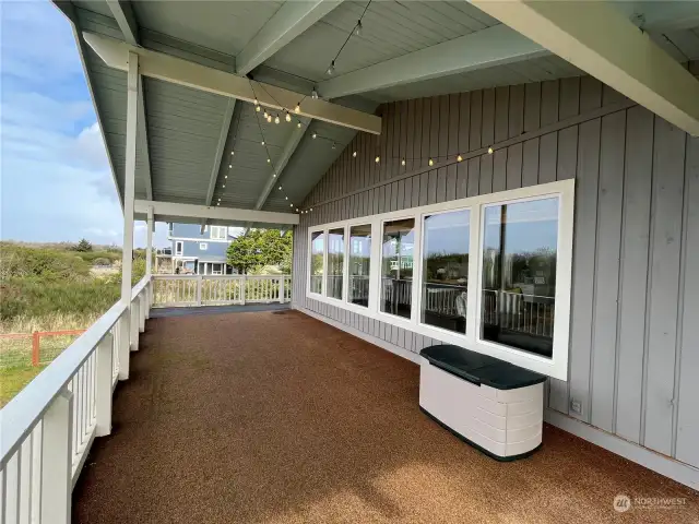 The rear sundeck is immense and gets full sun in the afternoon.  A great place for container gardening (protected from the dear).  Sundeck wraps around the house and can be accessed from the lower level courtyard as well as the upper level kitchen/living room.