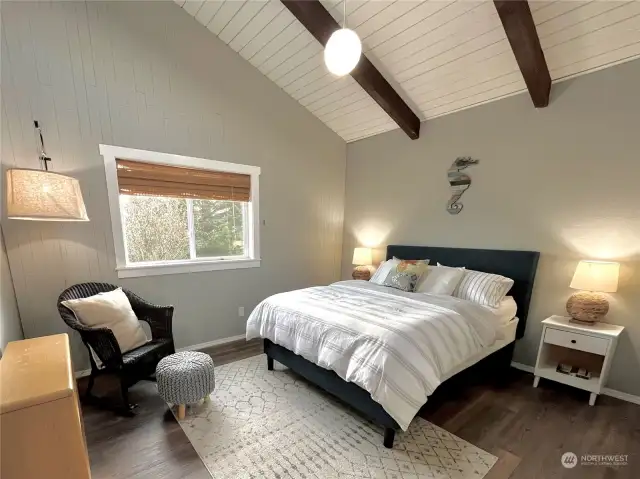 Bedroom #1 on Upper Level, just off kitchen.  Note custom blinds and new trim work.