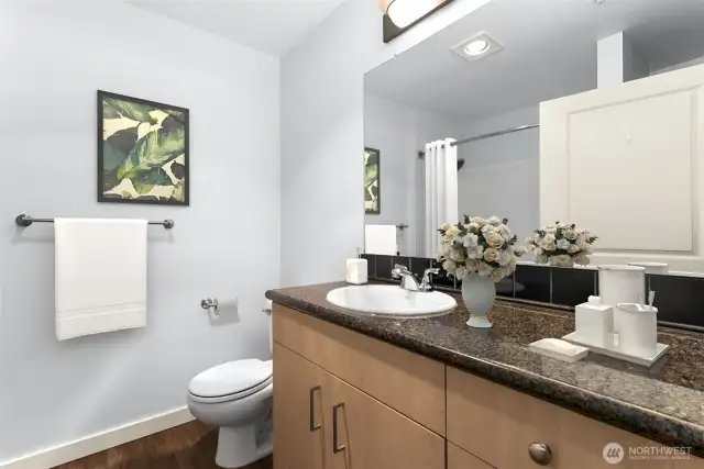 Second bath featuring granite countertops & plenty of storage in the vanity