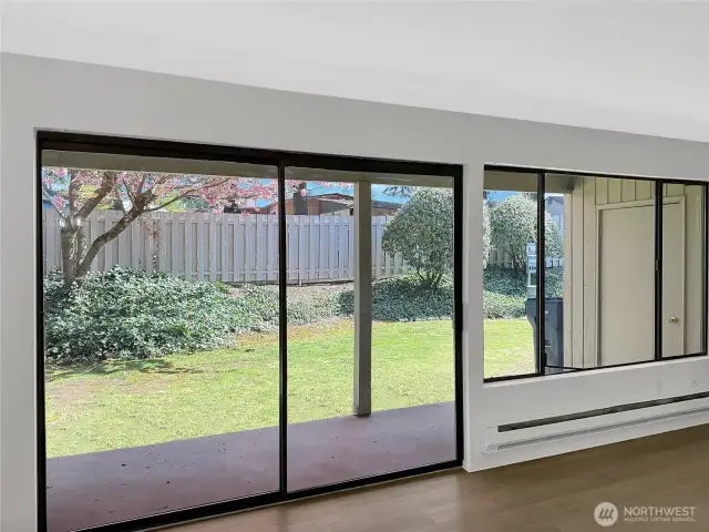 Large sliding doors leading to private back patio.