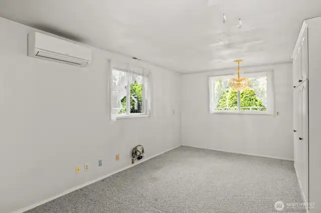 Family room - long view to open space and permanent cabinets
