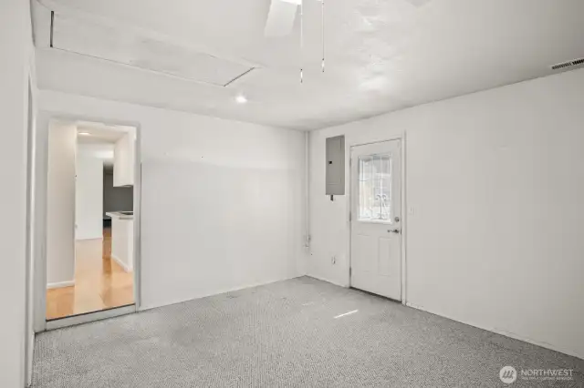 Entry from carport into Family room
