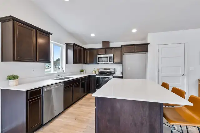 Photographs are for illustrative purposes only. Features, finishes, interior/exterior colors, landscaping and floorplan shown may vary from actual homes built.