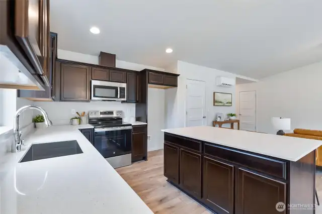 Photographs are for illustrative purposes only. Features, finishes, interior/exterior colors, landscaping and floorplan shown may vary from actual homes built.