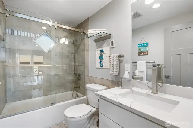 Full main-floor guest bath.