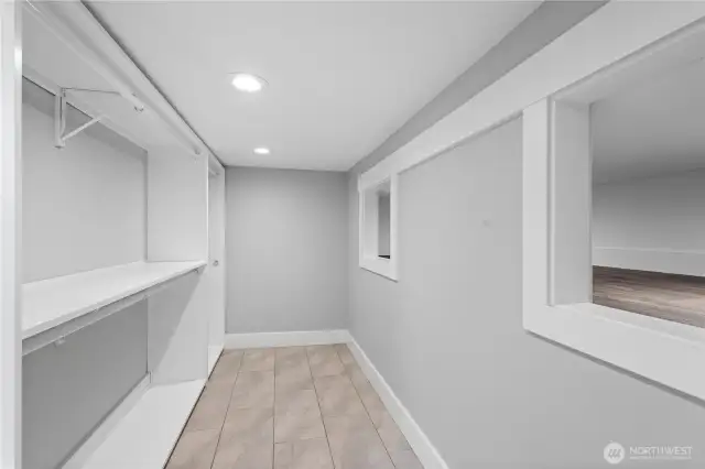 Large walk-in closets provide ample storage space.