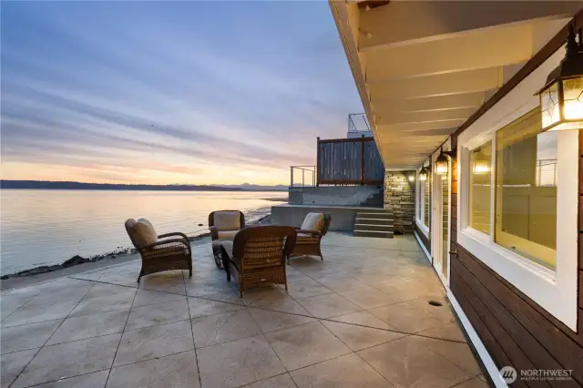 Patio with steps down to the beach.