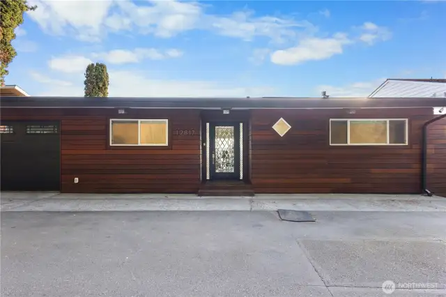 Approaching from the street, your garage & beautiful glass entry door welcome you home.