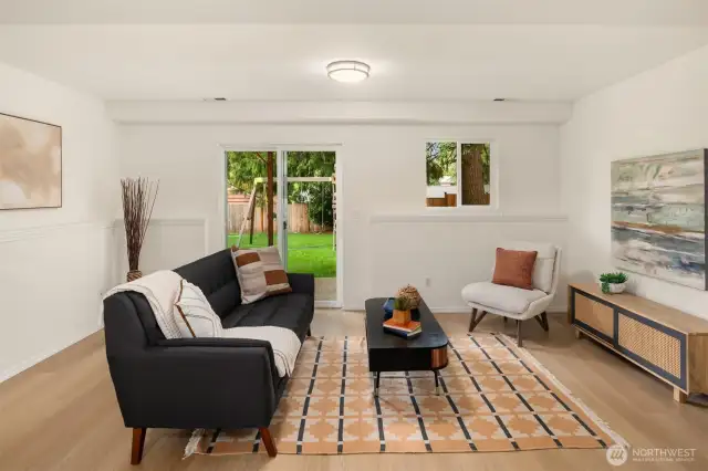 Access the huge back yard from the family room. Garage door is directly behind the couch (not pictured)
