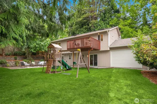 Lots of grass for playing on or having a picnic! Garage door has unique 2nd door which opens to yard.