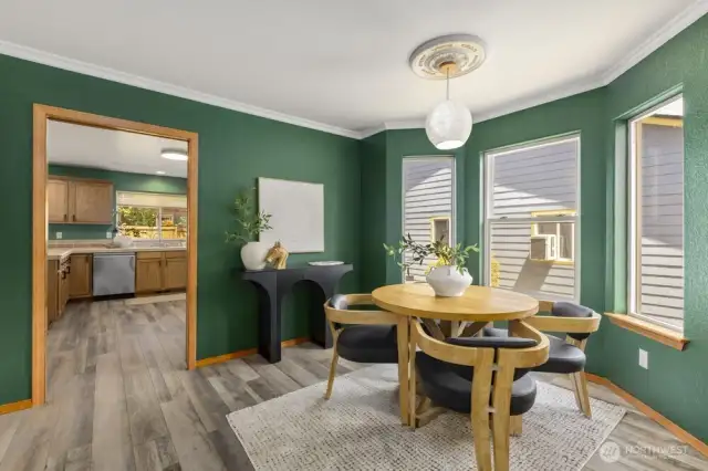 A pocket door between the formal dining room and the kitchen helps to control noise levels and hide any messes.