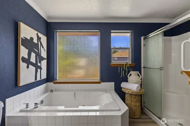 Whether you enjoy a long bath or a quick shower, you're set in a bathroom with a glorious soaking tub and walk-in shower.