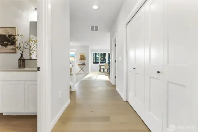 Main floor entry and 3/4 bath. Large coat closet has ample room for all your coats. Pictures depict a previously built home similar to the home going to be built on this lot. Floor plans, Elevations, colors, upgrades & materials may be different.