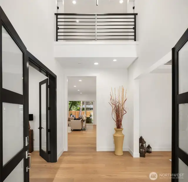 Soaring Double-Height Ceiling in the Foyer Flooded with Natural Light