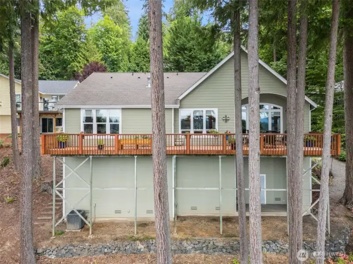 Newer Trex style decking (Wolf brand)  on the view side of the home.