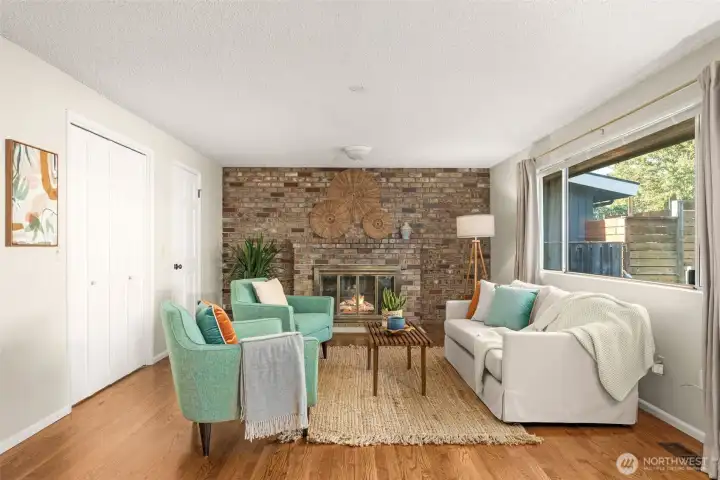 Family Room on the Main floor overlooks the Backyard
