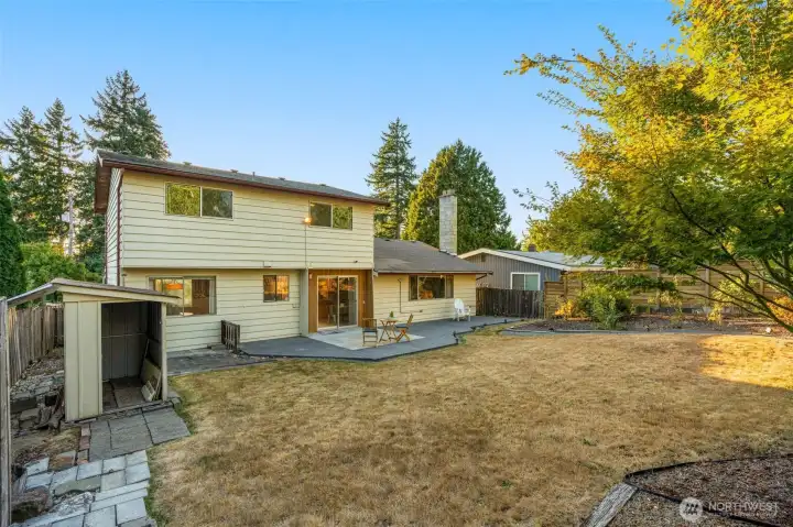 Backyard has Alley access and small storage shed