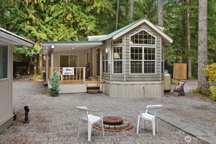 Lot 62 Division 2 Wilderness Way. The Glen at Maples Falls. Beautifully maintained one owner park model with a loft, covered deck, add a room, finished shed/gazebo. All finished with matching siding for a cohesive look.