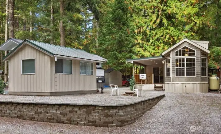 Lot 62 Division 2 Wilderness Way. The Glen at Maples Falls. Beautifully maintained one owner park model with a loft, covered deck, add a room, finished shed/gazebo. All finished with matching siding for a cohesive look.