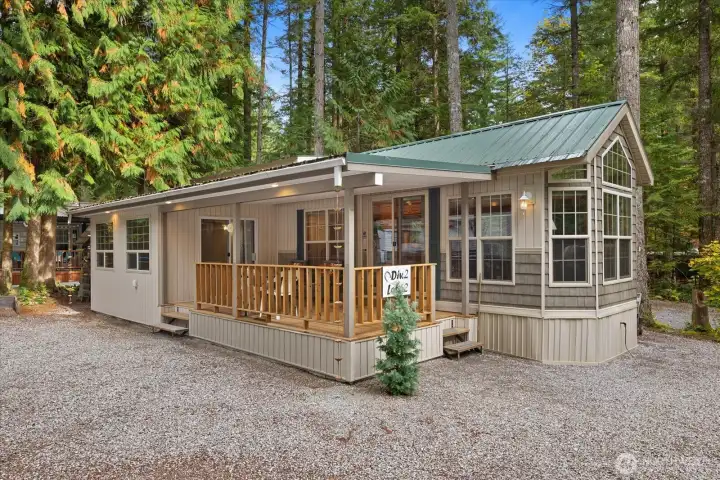Lot 62 Division 2 Wilderness Way. The Glen at Maples Falls. Beautifully maintained one owner park model with a loft, covered deck, add a room, finished shed/gazebo. All finished with matching siding for a cohesive look.