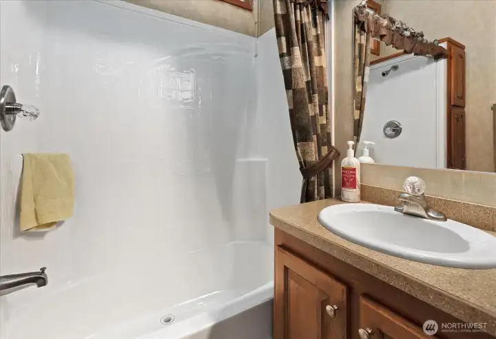 Full Bathroom with tub/shower combo.