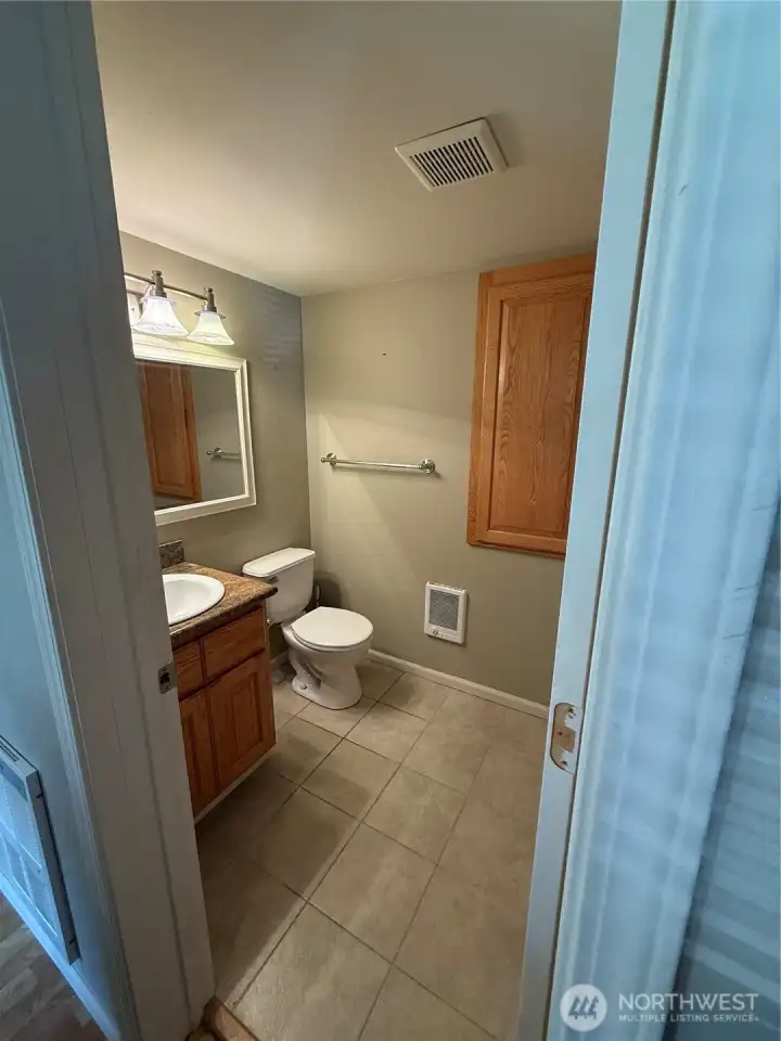 Bathroom between bedroom #1 and bedroom #2 on the North side of the home.