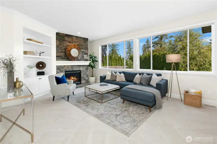 Inviting family room with a gas fireplace and custom built-ins.