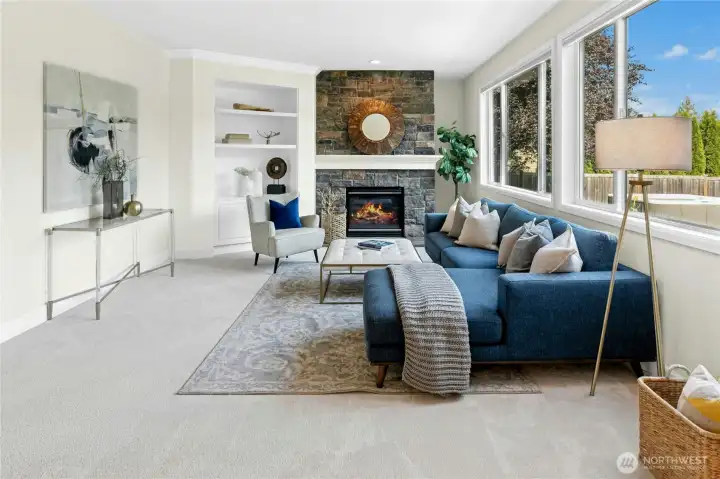 Elegant living room filled with natural light and framed by expansive views.