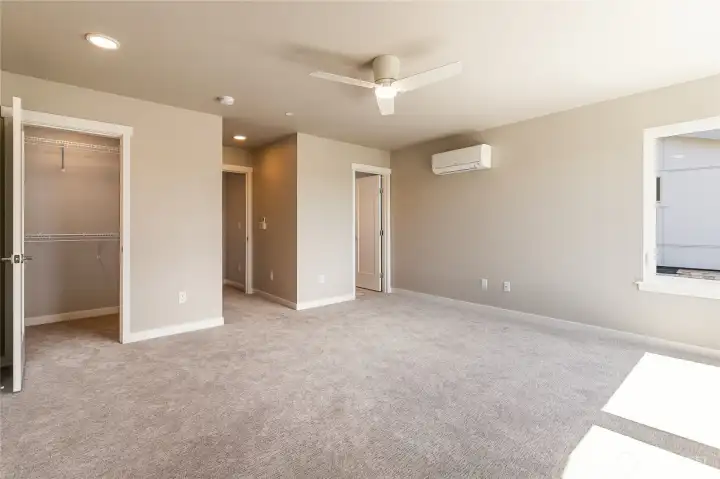 Primary with view to walk-in closet & ensuite.  Pic for reference of like unit. 552 Northview is under construction.