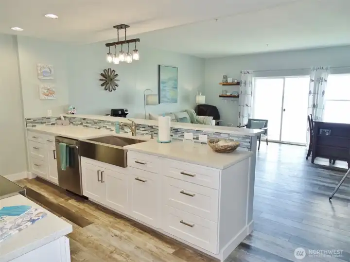 The Kitchen opens into the Living/Dining Room.