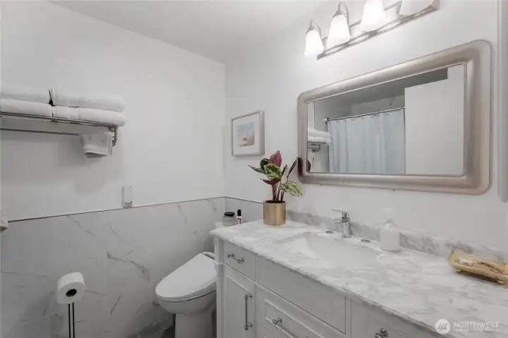 Upstairs full bathroom with upgrades.