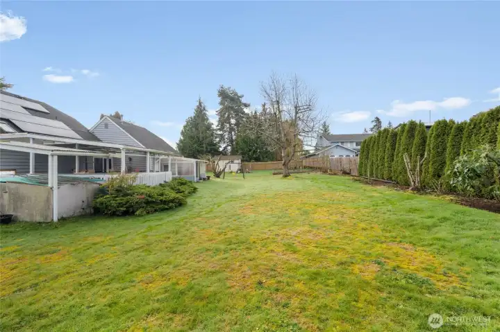 Nearly 1/2 an acre of level ground with beautiful landscaping.
