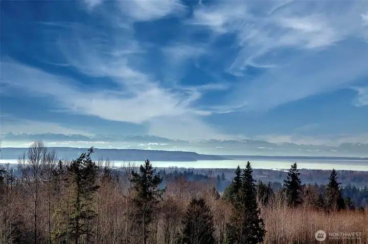 This is the view from the top of the hill looking west.  The lot does not have a Saltwater View.  It has a partial Lake View.