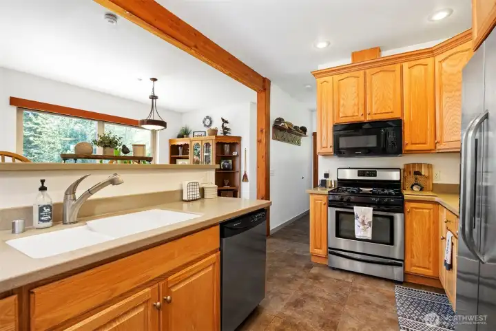 Looking toward the eating bar with the dining room beyond.