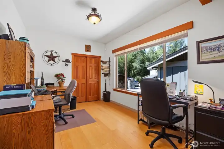 The office area is on the main floor and could be the 4th bedroom as it is quite large and looks toward the front of the home.