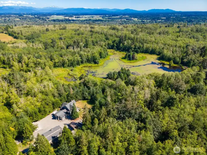 There are four parcels making about 70 acres and the potential to build another residence or two and possibly 4 detached ADU's.