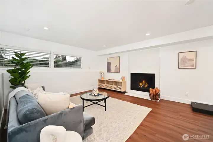 Rec room with wood burning fireplace