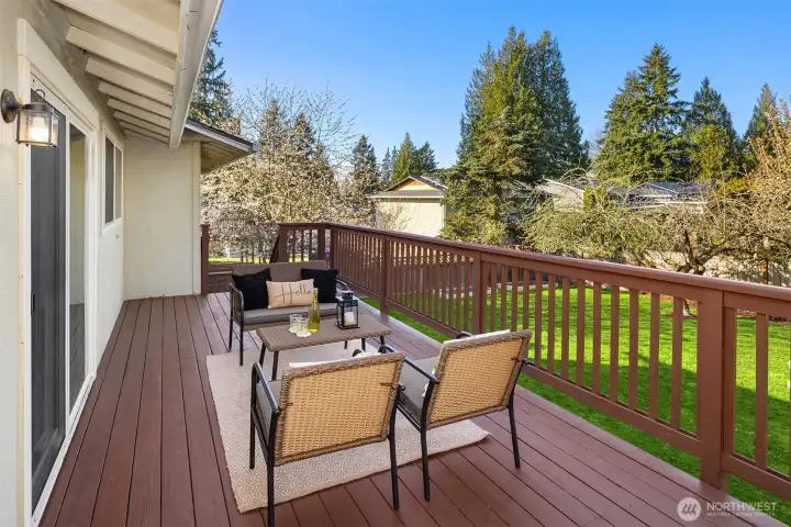 Expansive deck offers space to lounge, grill or dine alfresco!