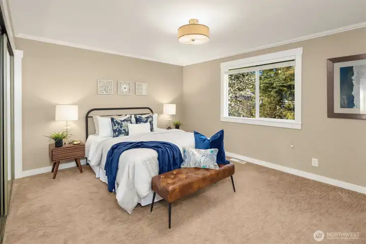 Generous primary bedroom suite